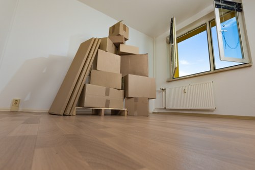 Man with van loading items for a move in Hounslow