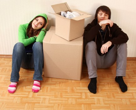 Packed boxes and furniture ready for a local move in Hounslow