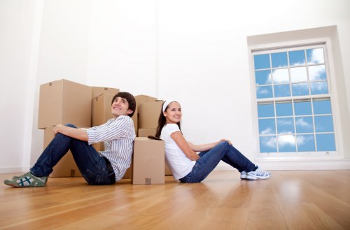 Loading furniture into a removal truck for transport in Hounslow