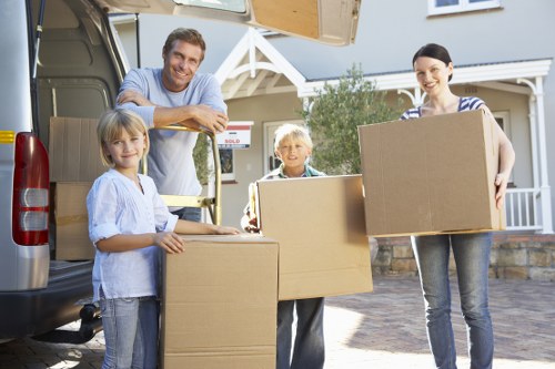 Local moving team packing boxes in Hounslow