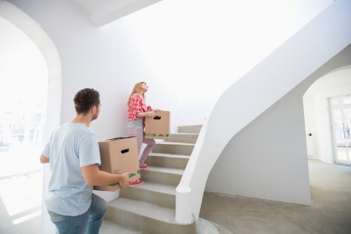Packed boxes and protected furniture ready for transport
