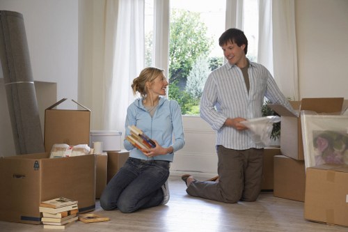 Office relocation equipment and furniture being loaded for a Hounslow business move