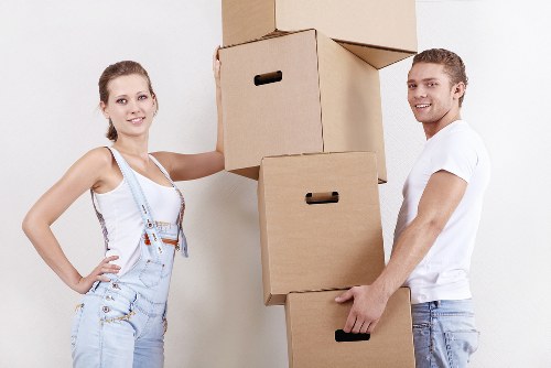 Packers organising boxes for a home removal in Hounslow