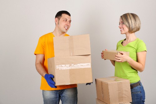 Furniture being carried from a flat in Hounslow